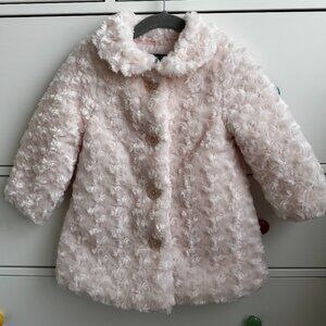 Cozy and soft pink toddler coat with buttons